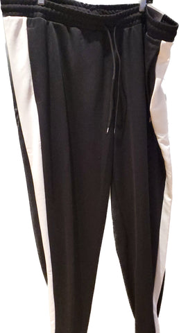 Pantalon puma noir cote blanc